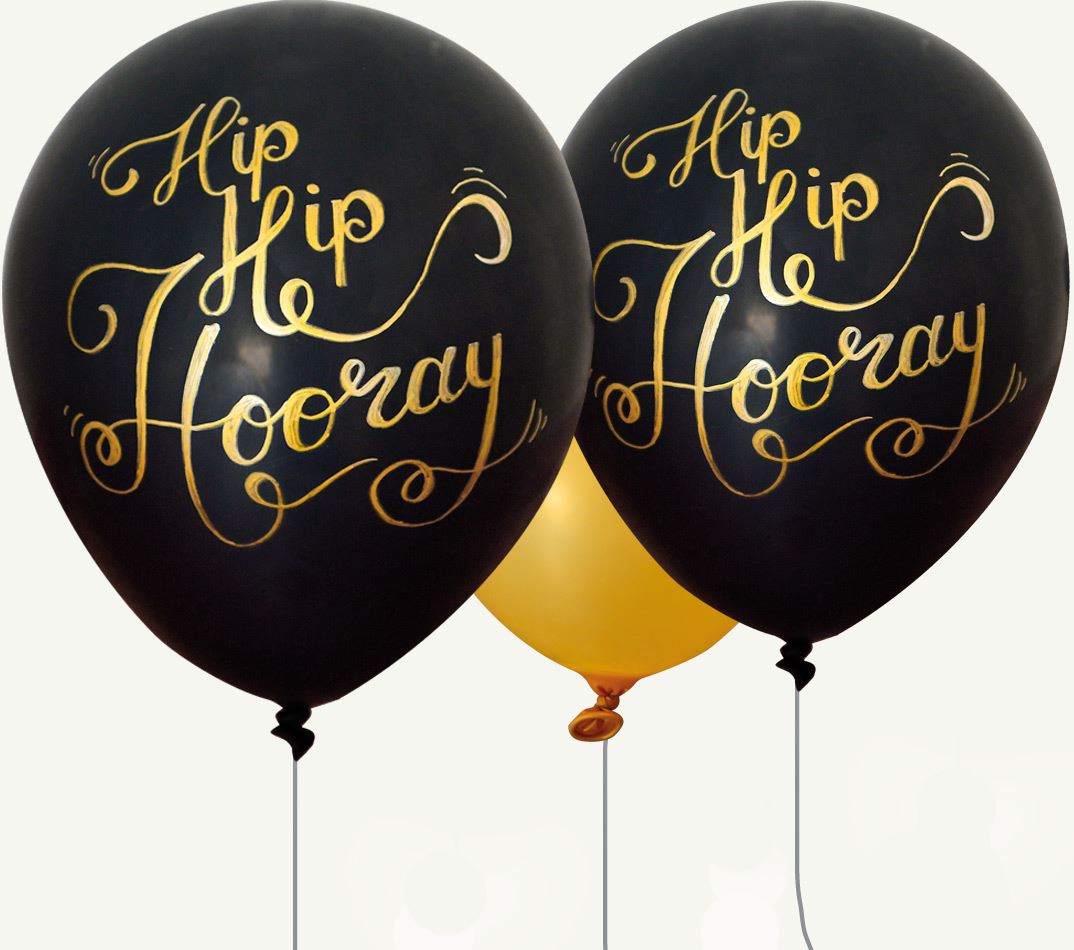 Two black balloons on which "Hip Hip Hooray" is written in gold.